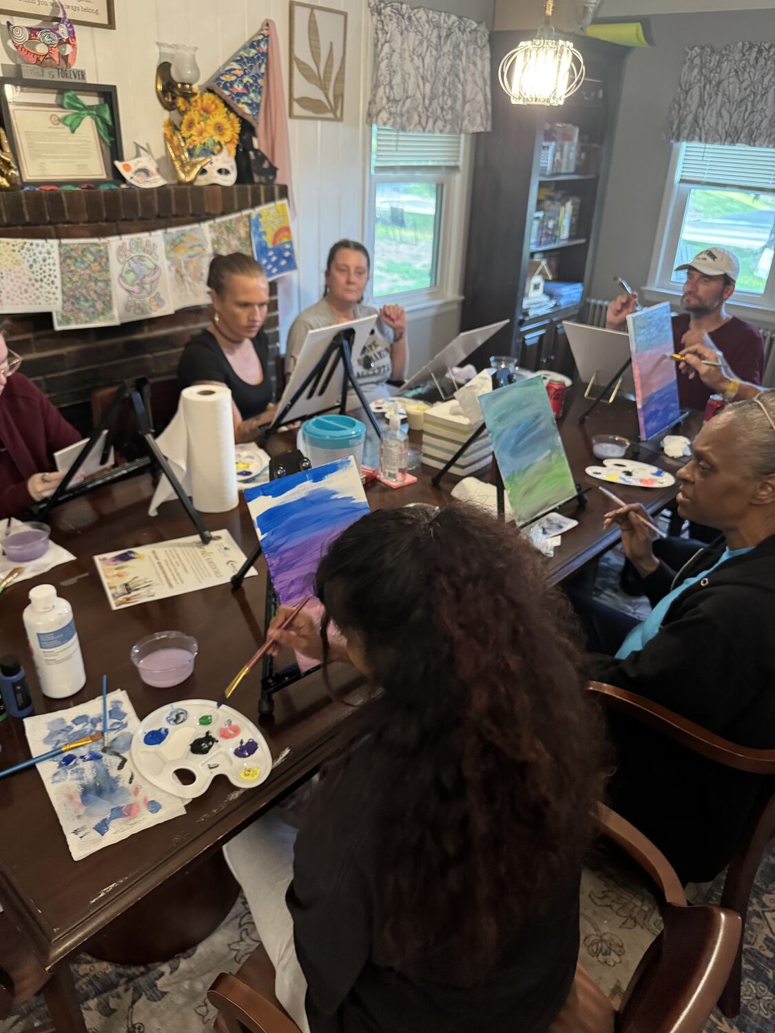 An indoor paint & sip in full swing